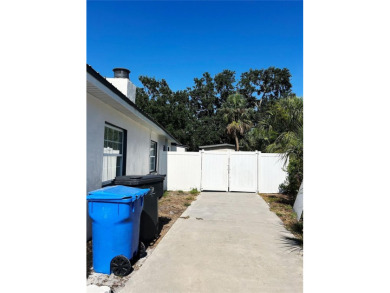 Welcome to this beautifully renovated 4-bedroom, 2-bathroom on Rocky Point Golf Course in Florida - for sale on GolfHomes.com, golf home, golf lot