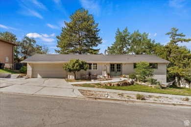 This beautiful home is perched high on the east bench of on Bountiful Ridge Golf Course in Utah - for sale on GolfHomes.com, golf home, golf lot