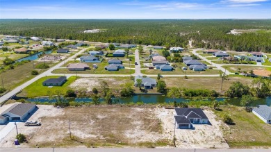 Build your dream home on this beautiful 0.23-acre freshwater on Del Tura Golf and Country Club in Florida - for sale on GolfHomes.com, golf home, golf lot