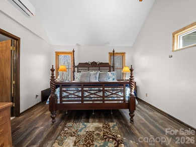 Resort home located at the tip of a quiet cul-de-sac street in on Rumbling Bald Resort on Lake Lure in North Carolina - for sale on GolfHomes.com, golf home, golf lot