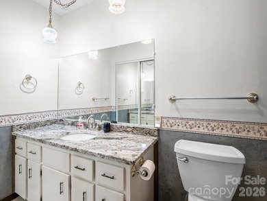 Resort home located at the tip of a quiet cul-de-sac street in on Rumbling Bald Resort on Lake Lure in North Carolina - for sale on GolfHomes.com, golf home, golf lot