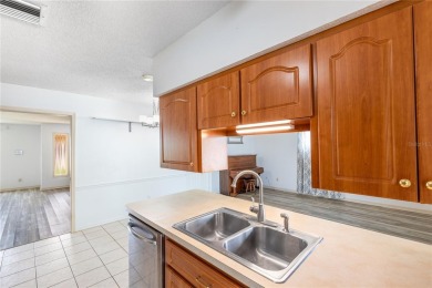 Welcome to your slice of paradise in the highly sought-after on Jacaranda West Country Club in Florida - for sale on GolfHomes.com, golf home, golf lot