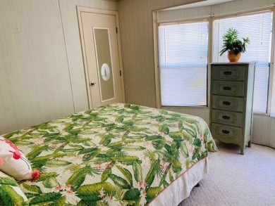 This home is in a 55 plus community with a monthly lot rent of on Crystal Lake Club in Florida - for sale on GolfHomes.com, golf home, golf lot