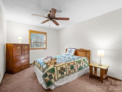 Resort home located at the tip of a quiet cul-de-sac street in on Rumbling Bald Resort on Lake Lure in North Carolina - for sale on GolfHomes.com, golf home, golf lot