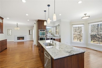 Discover an exceptional opportunity to own a stunning home in on Alpharetta Athletic Club East in Georgia - for sale on GolfHomes.com, golf home, golf lot