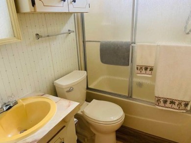 This home is in a 55 plus community with a monthly lot rent of on Crystal Lake Club in Florida - for sale on GolfHomes.com, golf home, golf lot