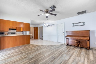 Welcome to your slice of paradise in the highly sought-after on Jacaranda West Country Club in Florida - for sale on GolfHomes.com, golf home, golf lot