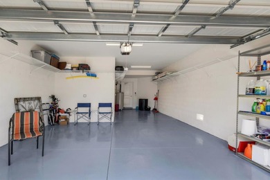 Beautiful Lakefront Coach Home with Golf Course Views! With over on Heritage Landing Golf  in Florida - for sale on GolfHomes.com, golf home, golf lot