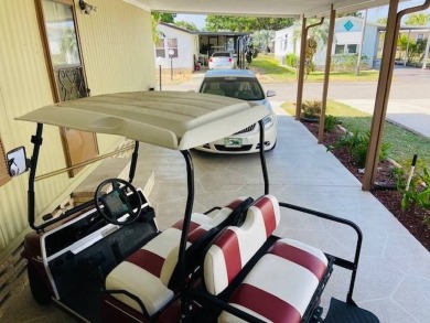 This home is in a 55 plus community with a monthly lot rent of on Crystal Lake Club in Florida - for sale on GolfHomes.com, golf home, golf lot