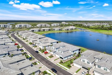 Beautiful Lakefront Coach Home with Golf Course Views! With over on Heritage Landing Golf  in Florida - for sale on GolfHomes.com, golf home, golf lot