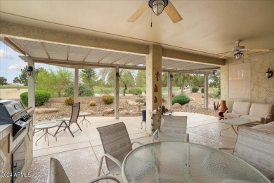 This gorgeous home in a 55+ gated resort offers great curb on Arizona Traditions Golf Club in Arizona - for sale on GolfHomes.com, golf home, golf lot