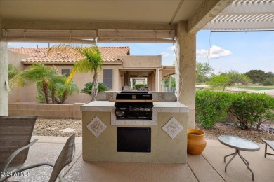 This gorgeous home in a 55+ gated resort offers great curb on Arizona Traditions Golf Club in Arizona - for sale on GolfHomes.com, golf home, golf lot