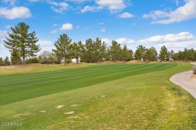 This gorgeous home in a 55+ gated resort offers great curb on Arizona Traditions Golf Club in Arizona - for sale on GolfHomes.com, golf home, golf lot