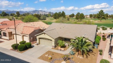 This gorgeous home in a 55+ gated resort offers great curb on Arizona Traditions Golf Club in Arizona - for sale on GolfHomes.com, golf home, golf lot