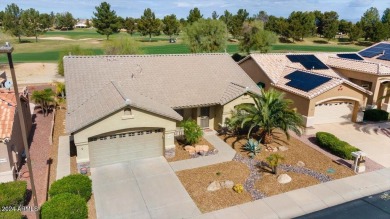 This gorgeous home in a 55+ gated resort offers great curb on Arizona Traditions Golf Club in Arizona - for sale on GolfHomes.com, golf home, golf lot