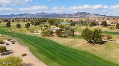 This gorgeous home in a 55+ gated resort offers great curb on Arizona Traditions Golf Club in Arizona - for sale on GolfHomes.com, golf home, golf lot