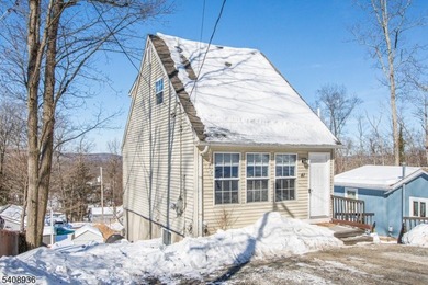 This charming custom home in the Cozy Lake section of Jefferson on Berkshire Valley Golf Course in New Jersey - for sale on GolfHomes.com, golf home, golf lot