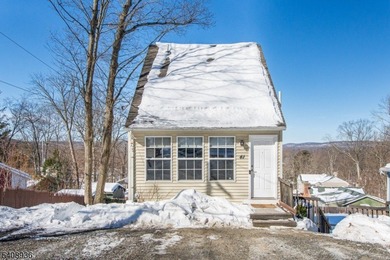 This charming custom home in the Cozy Lake section of Jefferson on Berkshire Valley Golf Course in New Jersey - for sale on GolfHomes.com, golf home, golf lot