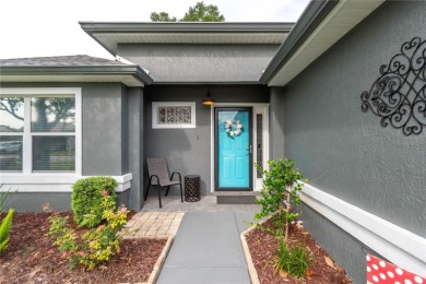 Welcome to this beautifully updated Turnberry Extended model on Royal Oaks Golf Club in Florida - for sale on GolfHomes.com, golf home, golf lot
