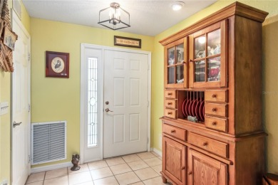 Welcome to this beautifully updated Turnberry Extended model on Royal Oaks Golf Club in Florida - for sale on GolfHomes.com, golf home, golf lot