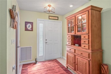 Welcome to this beautifully updated Turnberry Extended model on Royal Oaks Golf Club in Florida - for sale on GolfHomes.com, golf home, golf lot