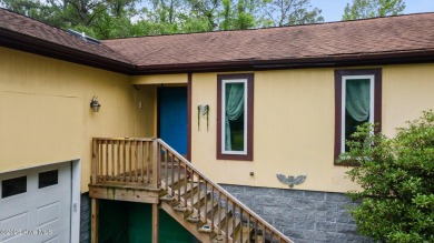 Welcome to this charming 3-bedroom, 2-bathroom home offering 1 on Harbour Point Golf Club in North Carolina - for sale on GolfHomes.com, golf home, golf lot