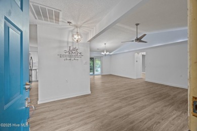 Welcome to this charming 3-bedroom, 2-bathroom home offering 1 on Harbour Point Golf Club in North Carolina - for sale on GolfHomes.com, golf home, golf lot