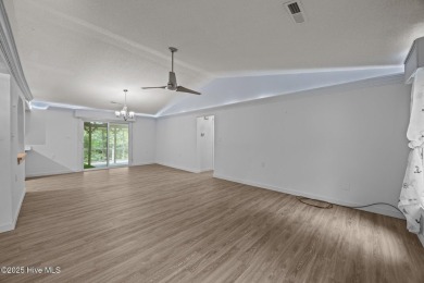 Welcome to this charming 3-bedroom, 2-bathroom home offering 1 on Harbour Point Golf Club in North Carolina - for sale on GolfHomes.com, golf home, golf lot