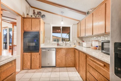 Beautifully remodeled triple-wide home offering 2 bedrooms, 2 on Painted Mountain Golf Club in Arizona - for sale on GolfHomes.com, golf home, golf lot