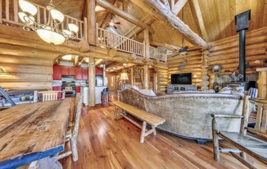 One of a kind, hand, crafted log home with extraordinary views on Lake Almanor Country Club in California - for sale on GolfHomes.com, golf home, golf lot