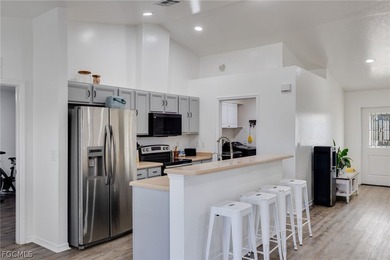 Beautifully updated 3-bedroom plus den, 2-bath home in SW Cape on Palmetto-Pine Country Club in Florida - for sale on GolfHomes.com, golf home, golf lot