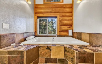 One of a kind, hand, crafted log home with extraordinary views on Lake Almanor Country Club in California - for sale on GolfHomes.com, golf home, golf lot