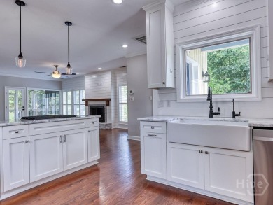 One level, open concept Landings waterfront home just a short on The Landings Club - Oakridge in Georgia - for sale on GolfHomes.com, golf home, golf lot