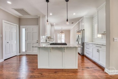 One level, open concept Landings waterfront home just a short on The Landings Club - Oakridge in Georgia - for sale on GolfHomes.com, golf home, golf lot