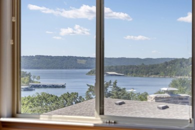 One owner, turn-key lakefront dream home w/private dock on Kimberling City Golf Club in Missouri - for sale on GolfHomes.com, golf home, golf lot