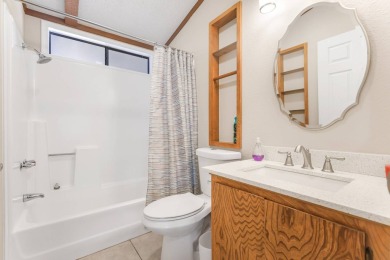 Beautifully remodeled triple-wide home offering 2 bedrooms, 2 on Painted Mountain Golf Club in Arizona - for sale on GolfHomes.com, golf home, golf lot