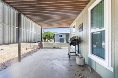 Beautifully remodeled triple-wide home offering 2 bedrooms, 2 on Painted Mountain Golf Club in Arizona - for sale on GolfHomes.com, golf home, golf lot