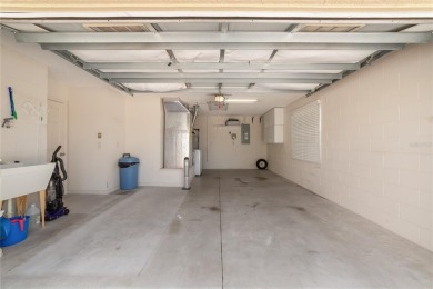 PRICE REDUCTION!  BOND PAID NEW ROOF AWESOME LOCATION between on Cane  Garden Golf Course in Florida - for sale on GolfHomes.com, golf home, golf lot