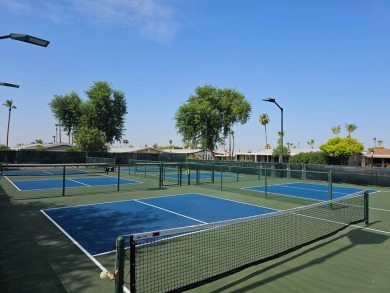 Beautifully remodeled triple-wide home offering 2 bedrooms, 2 on Painted Mountain Golf Club in Arizona - for sale on GolfHomes.com, golf home, golf lot