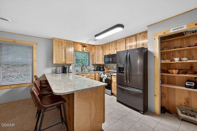 Nestled just outside the city limits of Gatlinburg, this on Bent Creek Golf Course in Tennessee - for sale on GolfHomes.com, golf home, golf lot