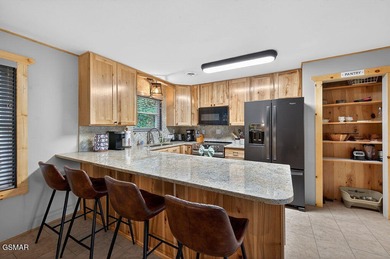 Nestled just outside the city limits of Gatlinburg, this on Bent Creek Golf Course in Tennessee - for sale on GolfHomes.com, golf home, golf lot