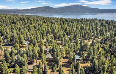 One of a kind, hand, crafted log home with extraordinary views on Lake Almanor Country Club in California - for sale on GolfHomes.com, golf home, golf lot