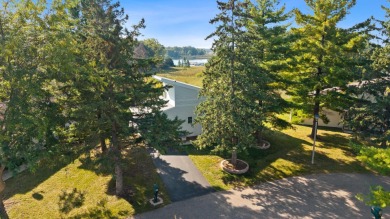Discover contemporary charm in this beautifully designed on Saddle Ridge Golf Club in Wisconsin - for sale on GolfHomes.com, golf home, golf lot