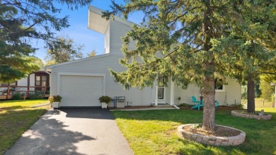 Discover contemporary charm in this beautifully designed on Saddle Ridge Golf Club in Wisconsin - for sale on GolfHomes.com, golf home, golf lot