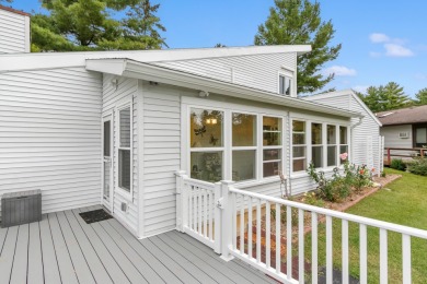 Discover contemporary charm in this beautifully designed on Saddle Ridge Golf Club in Wisconsin - for sale on GolfHomes.com, golf home, golf lot