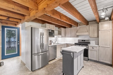 Discover contemporary charm in this beautifully designed on Saddle Ridge Golf Club in Wisconsin - for sale on GolfHomes.com, golf home, golf lot
