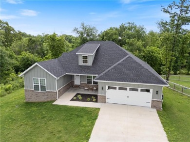 Welcome to 12 Lockhart Drive, a well-maintained 2023-built home on Bella Vista Country Club - Highlands in Arkansas - for sale on GolfHomes.com, golf home, golf lot