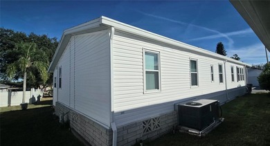 Come take a tour of this beautifully maintained 2 bed, 2 bath on Polo Park East in Florida - for sale on GolfHomes.com, golf home, golf lot