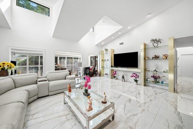 Enjoy comfortable South Florida living in this spacious 3-bed, 2 on Fountains Golf and Country Club in Florida - for sale on GolfHomes.com, golf home, golf lot