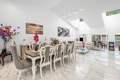 Enjoy comfortable South Florida living in this spacious 3-bed, 2 on Fountains Golf and Country Club in Florida - for sale on GolfHomes.com, golf home, golf lot